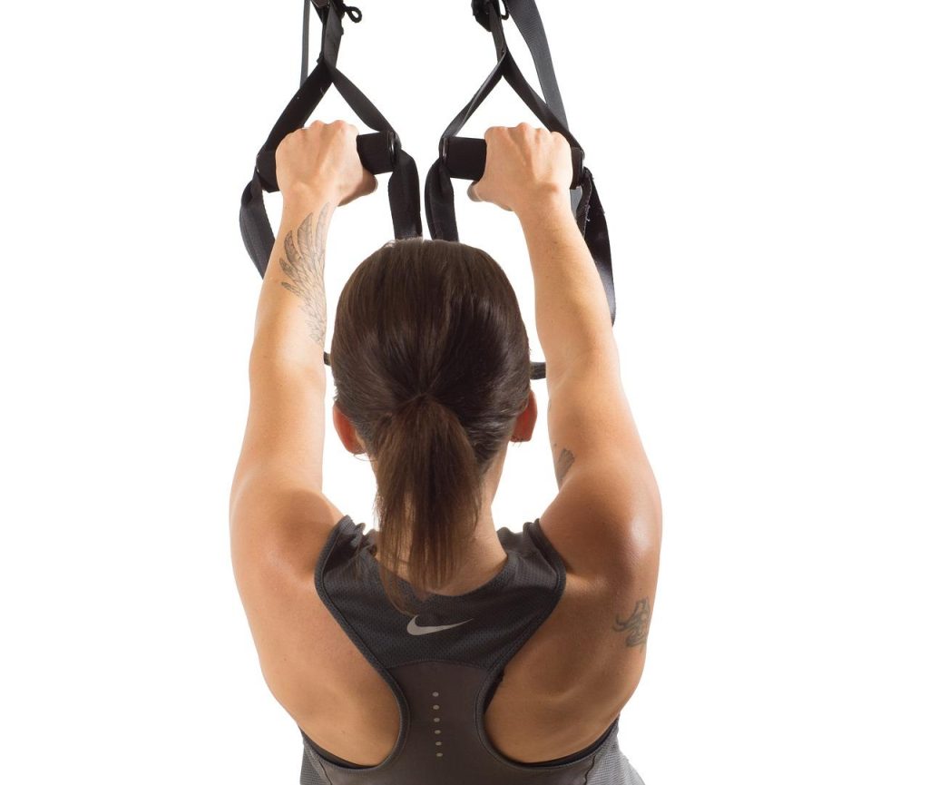 Thuis is waar de fitness is - thuisgym setup met yogamat, gewichten en trainingsapparatuur voor gezonde en actieve levensstij